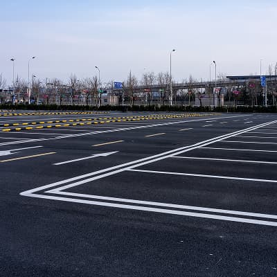 Fresh parking lot striping on commercial asphalt